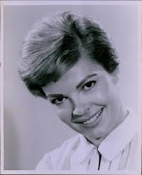 Patricia Owens smiling in swimsuit