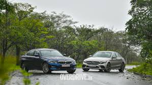 Comparison Test Bmw 3 Series Vs Mercedes Benz C Class Overdrive