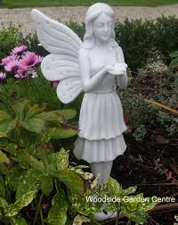 It isn't necessary to have a fairy theme in. Dinova Large Standing Fairy Dust Garden Ornament Woodside Garden Centre Pots To Inspire