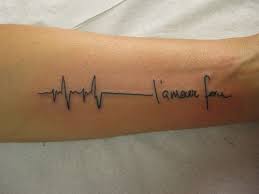 Heartbeat Or Ekg Line Tattoo Designs And Meanings Ecg Tattoo Line Tattoos Ekg Tattoo