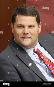 Sen. Bart Hester, R-Cave Springs, talks to another legislator in the Senate  chamber at the Arkansas state Capitol in Little Rock, Ark., Thursday, March  12, 2015. (AP Photo/Danny Johnston Stock Photo -