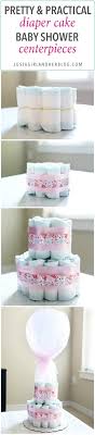 I personally would prefer a snickers poke cake at my baby shower but diaper cakes are definitely cuter. Diaper Cake Baby Shower Centerpieces Abby Lawson
