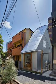 A room in a japanese style is filled with air, light, and permeated with harmony and the spirit of natural beauty and naturalness. Takeshi Hosaka Designs Tiny House In Tokyo With Funnel Like Roofs