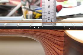 By and large, big strings and high action make better sound and how to set up a guitar. Acoustic Guitar Setup Flame Guitars