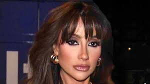 New Real Housewives Of Cheshire star Eleanor Egar goes braless in a barely  there dress as she makes a show-stopping arrival to Molly Smith's party