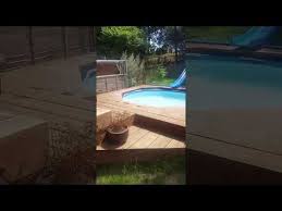 My Spring Project A Pool Deck For The Kids In The Garden Just A Mess In The Garden Dug Out A Hole Set The Posts In Place Pool Solar Pool