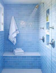A blue bathroom tile design looks cool, reflects the peaceful tranquility of water and is a natural fit in bathrooms. 40 Blue Glass Bathroom Tile Ideas And Pictures Blue Bathroom Tile Bathroom Design Blue Bathroom