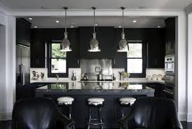 While white kitchen cabinets are classic and colorful kitchen cabinets are, we're ready for something a little moodier: Top 50 Best Black Kitchen Cabinet Ideas Dark Cabinetry Designs