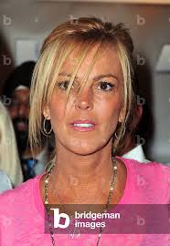 Image of Dina Lohan at a public appearance for Blackberry Brick Breaker