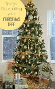 Best Tips For Decorating Your Christmas Tree Every Time Step By Step Simple Christmas Tree Christmas Tree Decorations Christmas Decorations