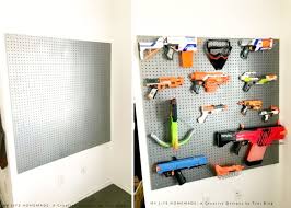Nerf gun storage nerf elite blaster rack by nerf 49 99 49 99 prime free shipping on eligible orders 3 3 out of 5 stars 34 manufacturer recommended age 8 years and up diy nerf gun wall whiskey tango foxtrot the easiest nerf gun storage wall for under 50 this is sure to be every kid s favorite spot in the. Behold 13 Clever Nerf Gun Storage Ideas Mum Central