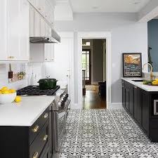 Popular white kitchen cabinets gleam with pizzazz, do you agree? White Top Cabinets Black Bottom Cabinets Design Ideas
