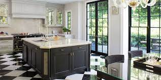 A white farmhouse kitchen with a metallic navy kitchen. 20 Polished Kitchens With Striking Black Kitchen Islands Dark Kitchen Island Trend