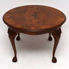 The round design is functionalized on the sides with 4 inbuilt open shelves where you can keep books. Large Antique Walnut Round Coffee Table 434658 Sellingantiques Co Uk