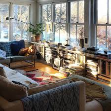 Living Room Shelving Under Wall Of Windows Two Walls Of Windows Around Seating Area So Lovely Farm House Living Room Home Living Room House Interior