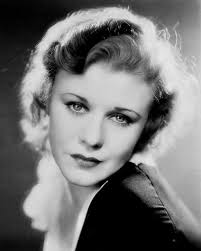 A black and white photo of a woman. Ginger rogers actress vintage.