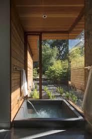 The heating mechanism is in the box located behind the japanese soaking tub. 19 Japanese Soaking Tubs That Bring The Ultimate Comfort