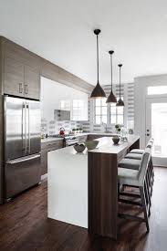 Written By Julie Sanders This Renovation Included A Kitchen Design By Sarah Kahn Turner Of Jennife Raised Kitchen Island Modern Kitchen Bar Kitchen Island Bar