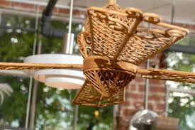 With the latest technology in dc motors, the ceiling fan uses 65% less energy than ac motor ceiling fans. Vintage Rattan Ceiling Fan At 1stdibs