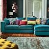The sofa is an excellent selection for any glam home. 1