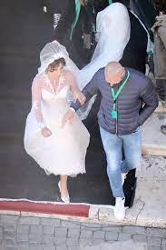 Is lady gaga planning her wedding? Lady Gaga Wears Wedding Dress While Filming House Of Gucci