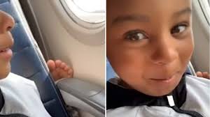Houston 4-year-old Rodney Small reacts to woman's bare feet