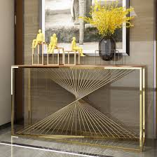 Constructed of gold finished stainless steel and solid stone top, it's guaranteed to be the highlight of any room. China Modern Luxury Stainless Steel Design Living Room Furniture Gold Console Table China Furniture Bedroom Furniture