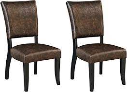 We stock over 100 different sets from ashley furniture: Amazon Com Signature Design By Ashley Sommerford Dining Chair Side Faux Leather Brown Furniture Decor