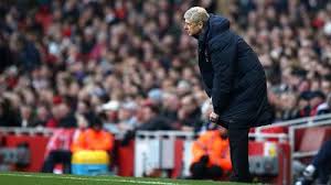 Where did the wenger out sign come from? One Memorable Look Mr Arsene Wenger S Oversized Touchline Coat The Journal Mr Porter