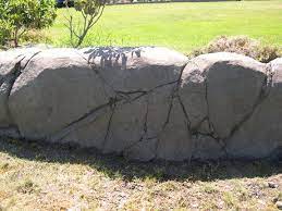 Natural Creations In Rock And Water Diy Stone Wall Stone Wall Design Faux Stone Walls