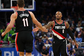 Did that random fan just rush lillard? Meyers Leonard Picks Damian Lillard S 2019 Buzzer Beater Over 2014 Shot Blazer S Edge