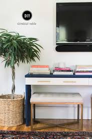 Here were the things i wanted… counter height, storage, the ability to sit around it and it had to be inexpensive. Ikea Hack Diy Console Table