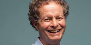 Whole Foods' colorful co-founder John Mackey is checking out as CEO
