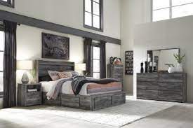 We sell kids, queen, and king size bedroom sets that feature bed, dresser, nightstand, chest, and mirror in canada. Baystorm 4pc Panel With Storage On Both Sides Bedroom Set In Gray Smokey Gray Finish Over Replicated Oak Grain With Authentic Touch Contem