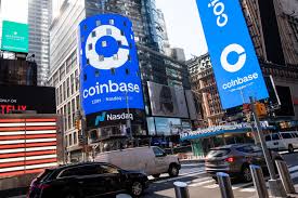 People watch as the logo for coinbase global inc, the biggest u.s. Coinbase Coin Earnings Q1 2021