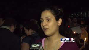 VIDEO: A Vigil Takes Place For Those Impacted By President Trump's Travel  Ban