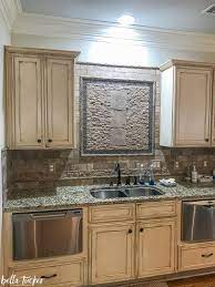 The inspiration behind my decision to distress my kitchen cabinets came from this article. Rescuing And Reviving A Glazed And Distressed Kitchen Bella Tucker