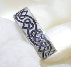 Pin By Lea Setegn On Tattoos Designs Tattoo Wedding Rings Wedding Band Tattoo Celtic Wedding Bands