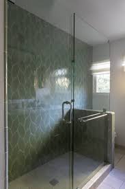 You usually see glass tiles used as a backsplash or in shower tile ideas such as an accent tile striped across the shower wall. 84 Shower Tile Glass Door Styles Ideas In 2021 Shower Tile Glass Shower Doors Tile Installation