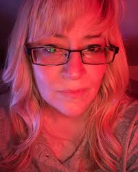 This is me, btw. I've been crying myself to sleep every night for over a  month. It's pretty dark in here. That's why it looks so red. Well… that and  the fact