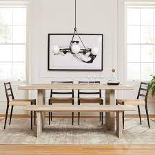 This dinner table is made of solid rough mango wood, a tropical hardwood with the strength to bear the weight. Santa Rosa Plank Dining Table