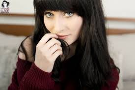 Is this the same girl? Hd Wallpaper Suicide Girls Blue Eyes Black Hair Sweater Sensual Gaze Women Wallpaper Flare