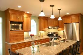 Small Kitchen Natural Cherry Cabinets With Granite Countertops Stainless Steel Appliances Cor Small Kitchen Granite Countertops Kitchen Transitional Kitchen