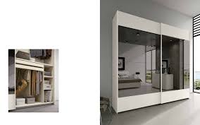 Armadio 2 ante scorrevoli in finitura bianco e rovere con anta a specchio.un elemento di design ,capiente e semplice.funzionale ed elegante è perfetto per dare posto a tutti quegli oggetti che non trovano una precisa collocazione in casa,sfruttando al minimo gli spazi ad un prezzo accessibile.ideato per collocarlo all'ingresso di casa ma con caratteristiche che permettono di abbin Armadi Moderni A Torino