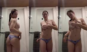 Behold Sierra Cabot's- alluring beauty- as she showcases her busty tits- and seductive moves- in this must-see video.