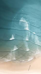 1080x1920 Peaceful Beach Calm Sea Waves Aerial View Wallpaper Waves Wallpaper Beach Wallpaper Sea Waves