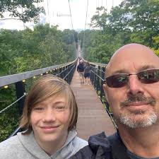 Is the expanded thumb a pain to change back and forth with different  buckets?