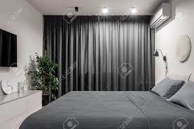We did not find results for: Luminous Modern Bedroom With White Walls With A Relief Picture There Is A Double Bed With