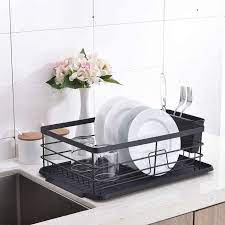 Comprising a sleek black wire rack above a matt black tray, this simple but stylish would nicely complement any modern kitchen décor! Five Favorites Chic Black Dish Drainers Remodelista