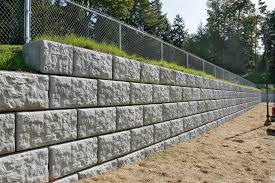 Modular block, an attractive alternative to the use of natural stone retaining walls, is popular as a retaining wall material because not only is it attractive but it is less expensive than natural stone.with five different kinds of modular block to choose from at alliance stone, you are sure to find what you need here. Solid Concrete Block Retaining Wall Novocom Top